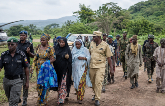 Joint security personnel escorting rescued kidnap victims to safety in rural Kwara State